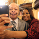 Letitia James taking a selfie with a churchgoer at Brown Memorial Baptist Church on Sunday, September 9, 2018.